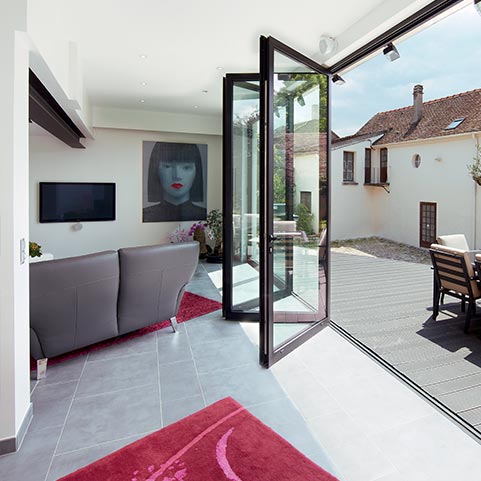 Aluminium sliding folding doors with slim sightlines that create a premium look